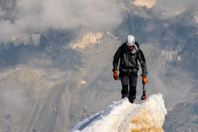 mountain climber at summit